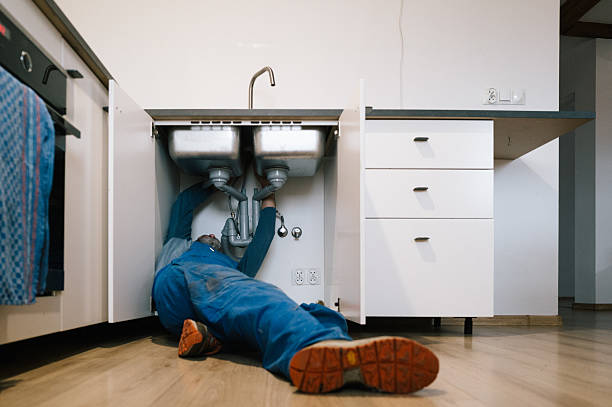 Professional Emergency Plumber technician working in Osseo, MN